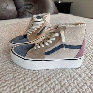 Woman’s high top Van’s size 8.5 never warn.